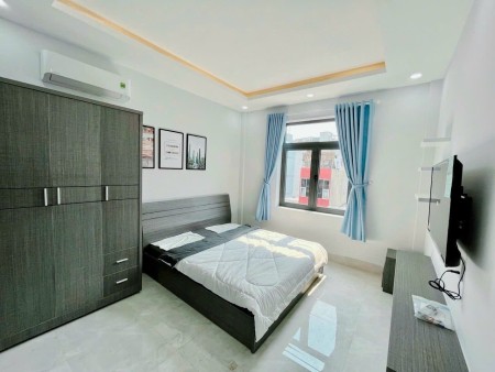 Cho thuê căn hộ 1 phòng ngủ tách bếp cửa sổ thoáng máy giặt riêng Vạn Kiếp gần Chợ Bà Chiều, Quận 1