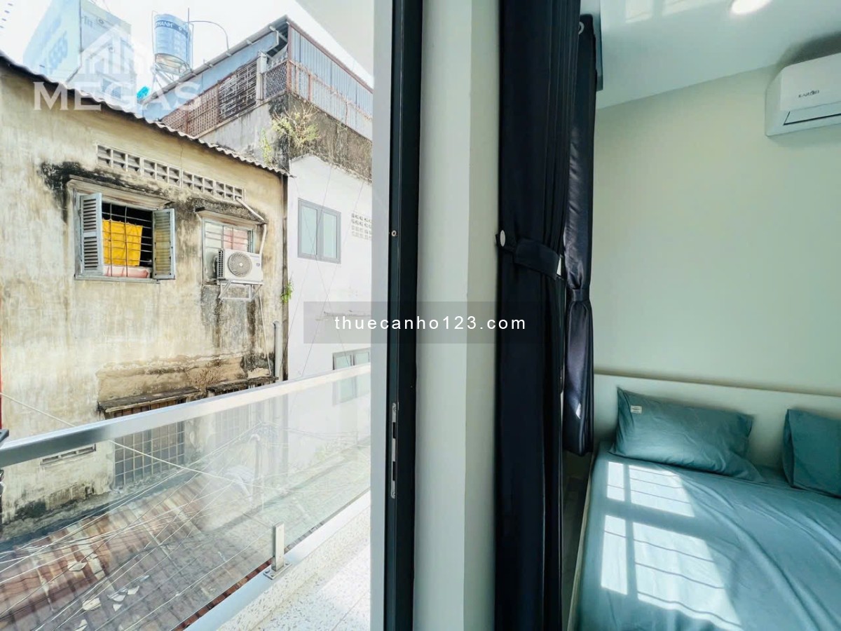 Cho thuê căn hộ đường Lê Thánh Tôn gần chợ Bến Thành - ban công thoáng, máy giặt riêng