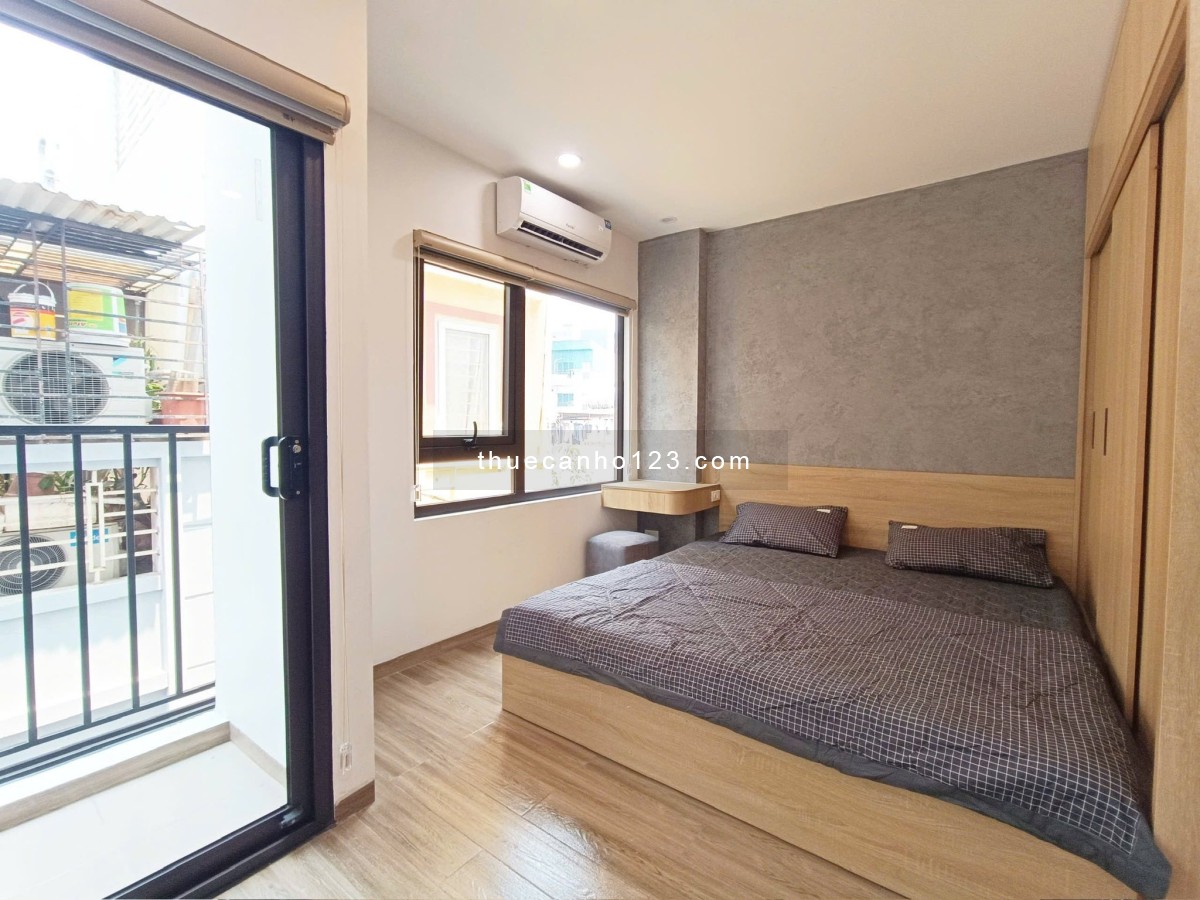 Cho thuê căn hộ mới 100% - 1PN, 1PK / Studio ban công, máy giặt riêng gần sân bay Tân Sơn Nhất-K300