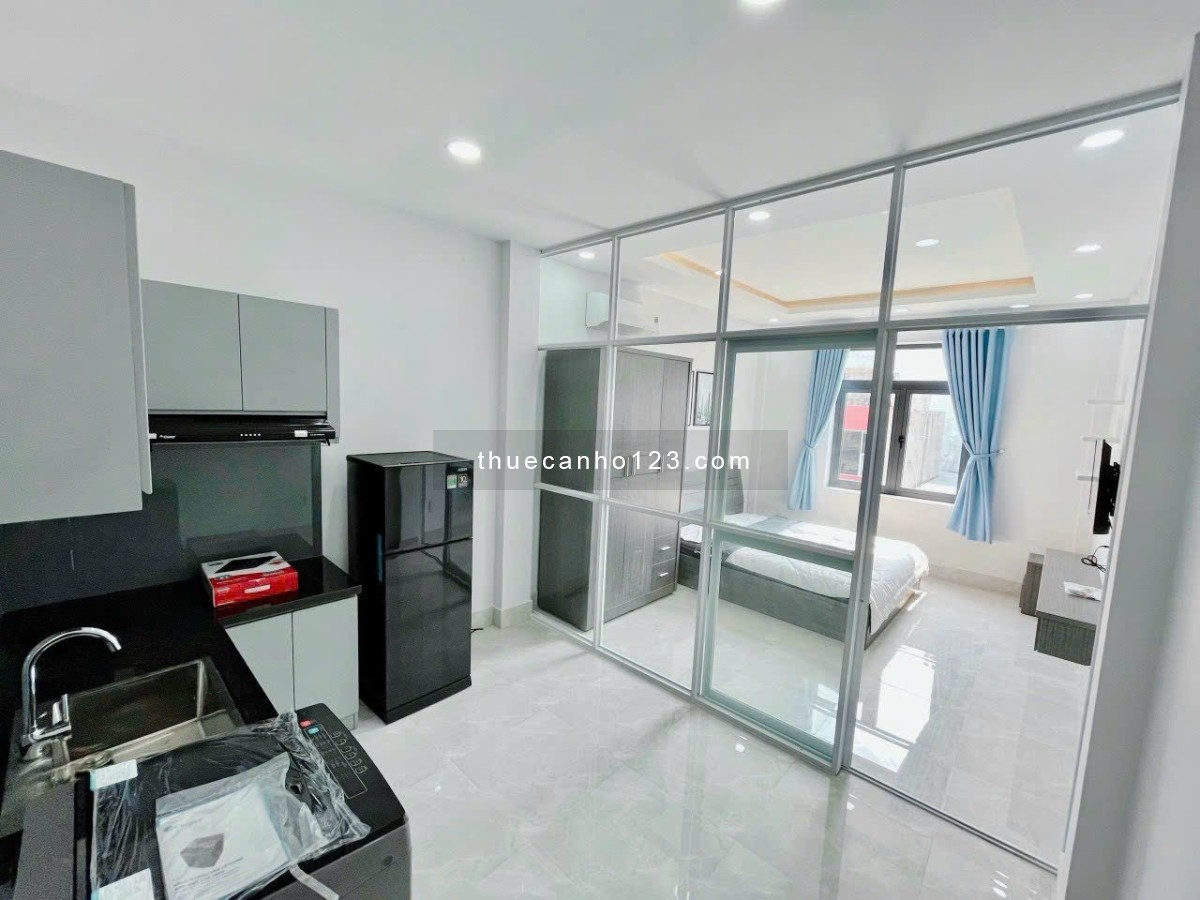 Cho thuê căn hộ 1 phòng ngủ tách bếp cửa sổ thoáng máy giặt riêng Vạn Kiếp gần Chợ Bà Chiều, Quận 1 - Ảnh 2