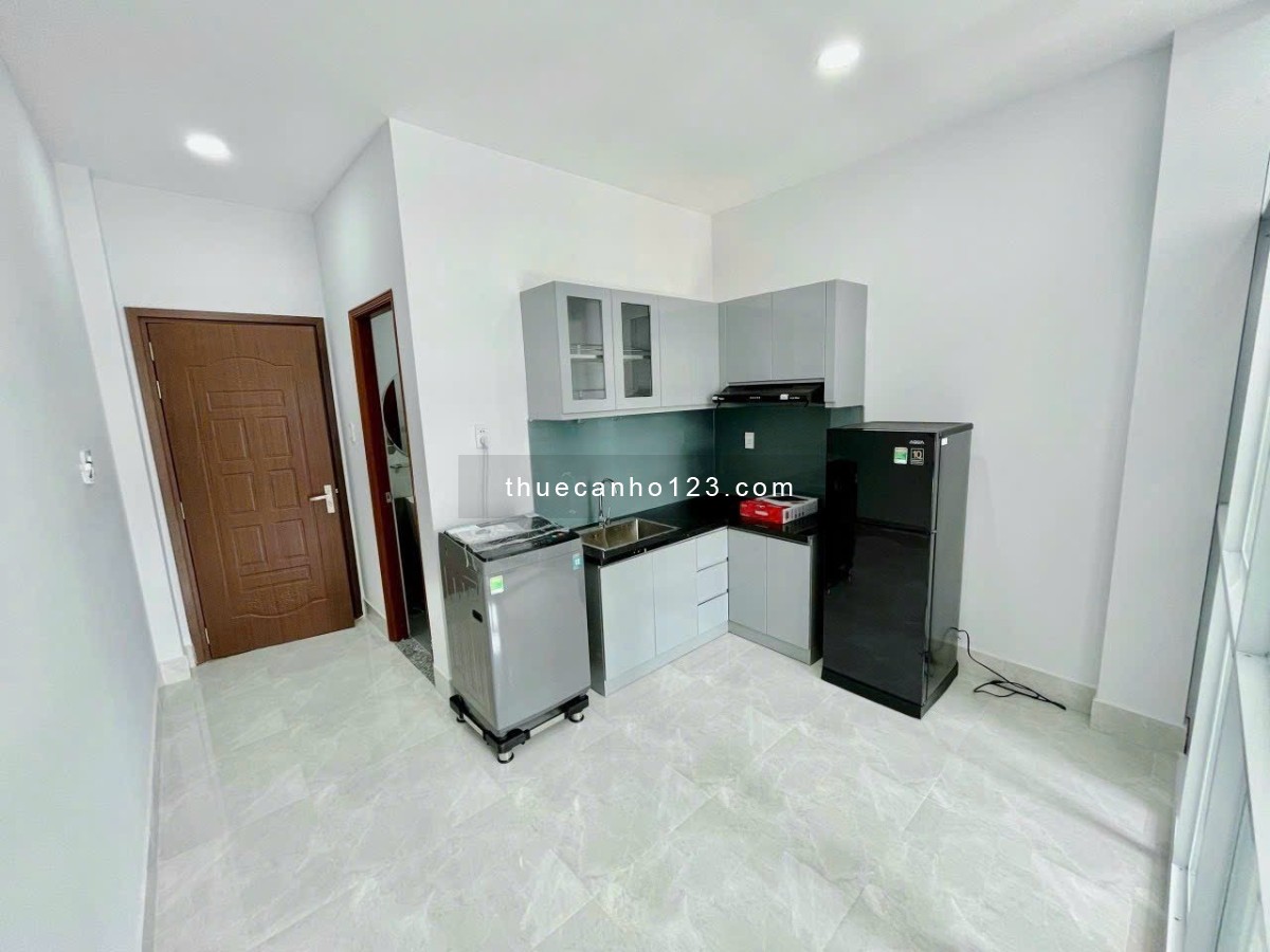 Cho thuê căn hộ 1 phòng ngủ tách bếp cửa sổ thoáng máy giặt riêng Vạn Kiếp gần Chợ Bà Chiều, Quận 1 - Ảnh 3