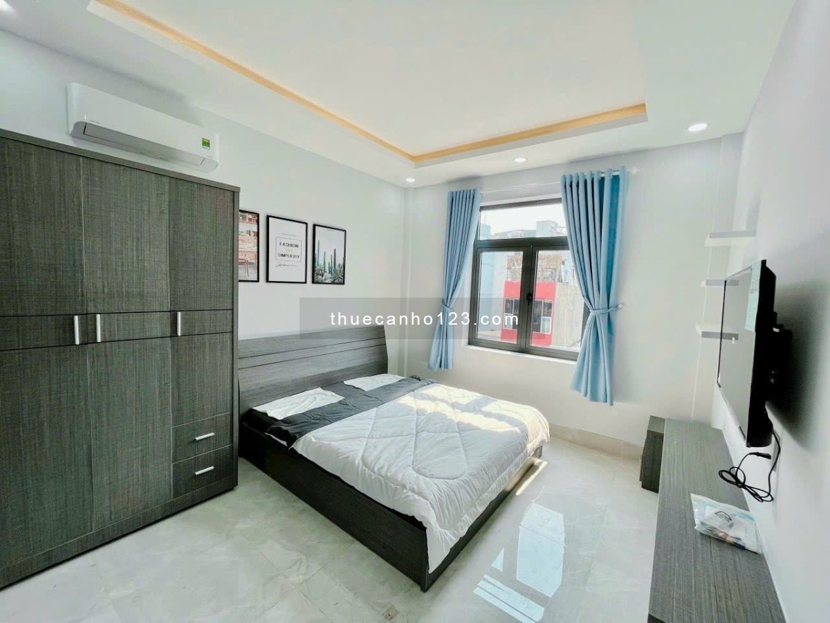 Cho thuê căn hộ 1 phòng ngủ tách bếp cửa sổ thoáng máy giặt riêng Vạn Kiếp gần Chợ Bà Chiều, Quận 1 - Ảnh 1